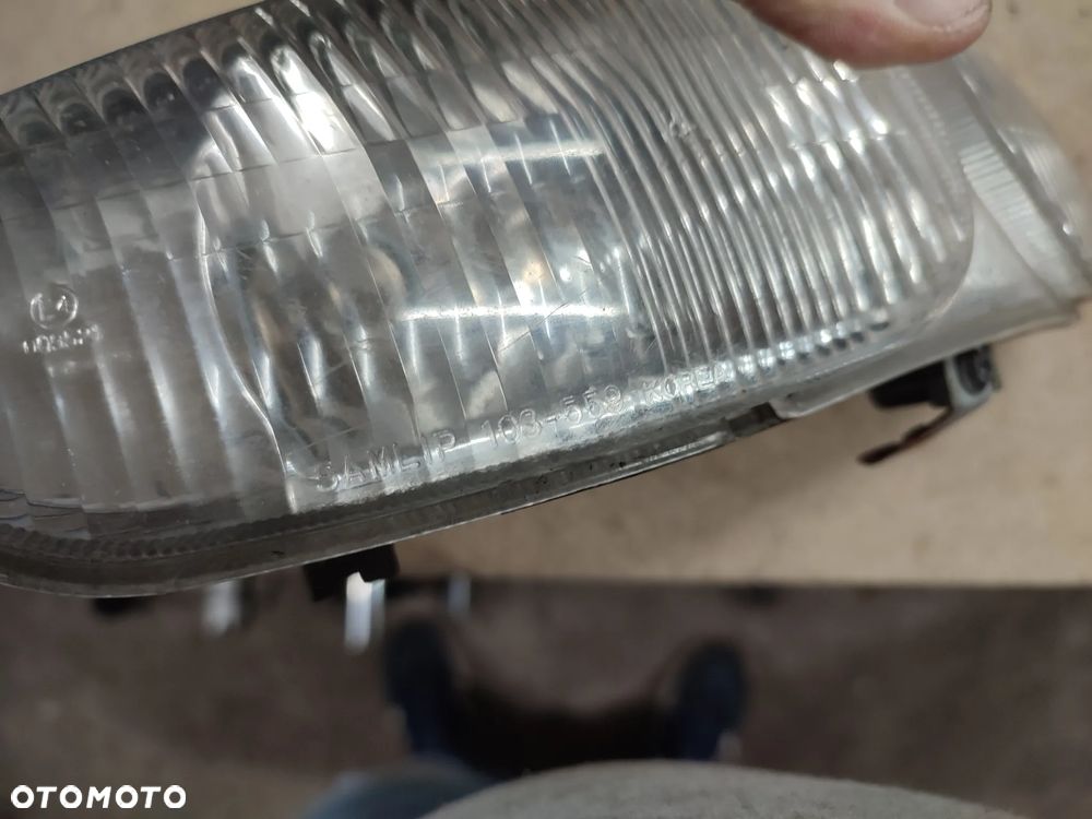 Lampa przednia, reflektor przód Daelim Message 50 - 12