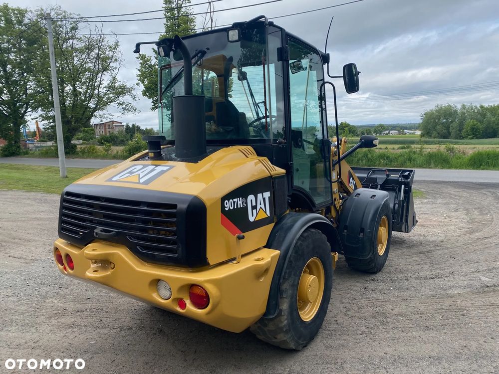 Caterpillar CAT 907H2, 2014 ROK, 4900 MTH, ŁYŻKA OTWIERANA + WIDŁY, z NIEMIEC, - 6