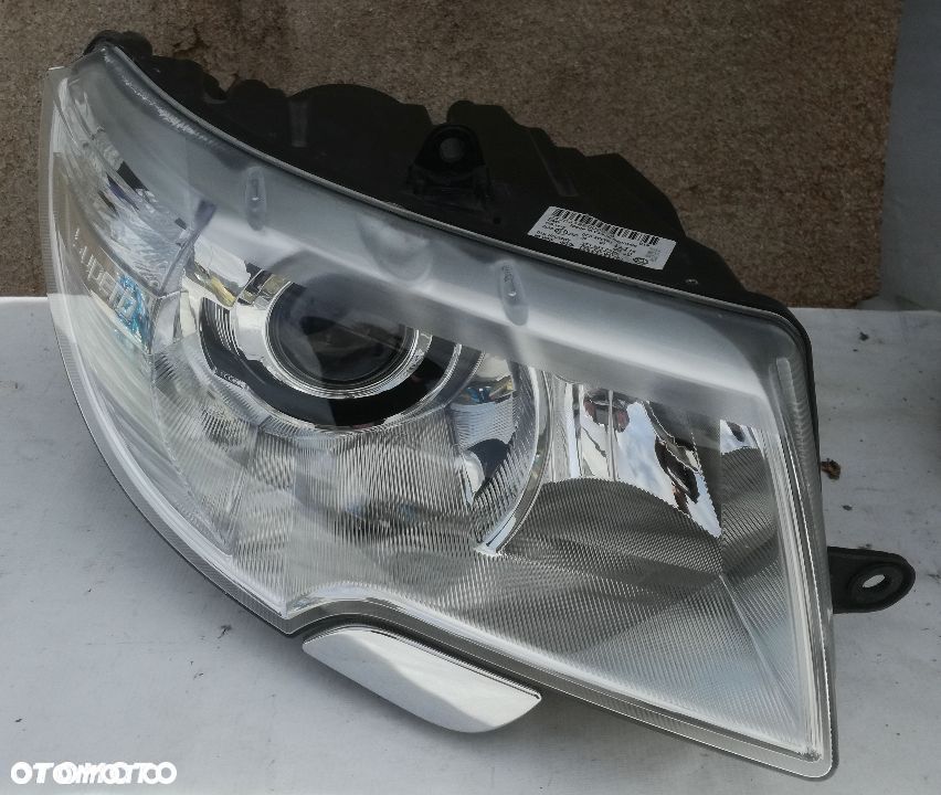 Bi-xenon prawy lampa prawa Skoda Superb 2008- - 1