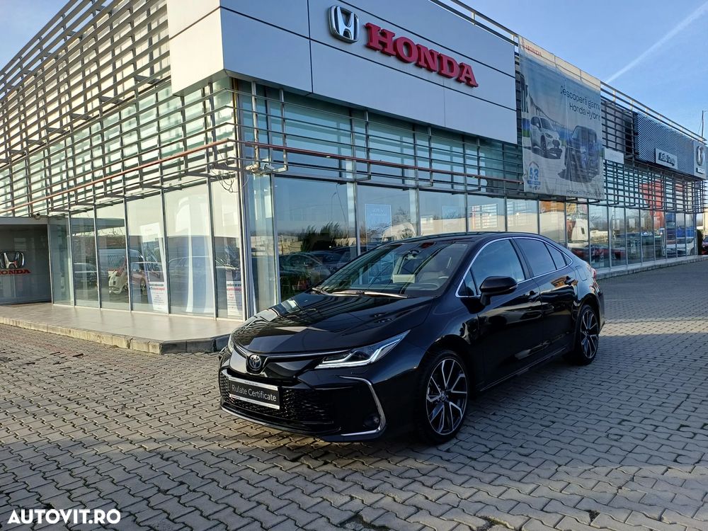 Toyota Corolla TS 1.8 HSD Exclusive - 1