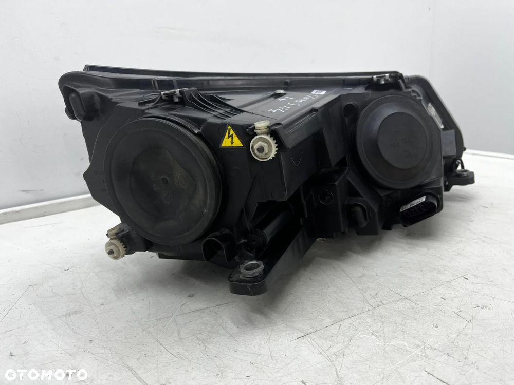 Lampa reflektor VW Tiguan 1 I 5n LIFT 10-16r. lewa przednia XENON EU skrętna doświetlanie zakrętów + - 13