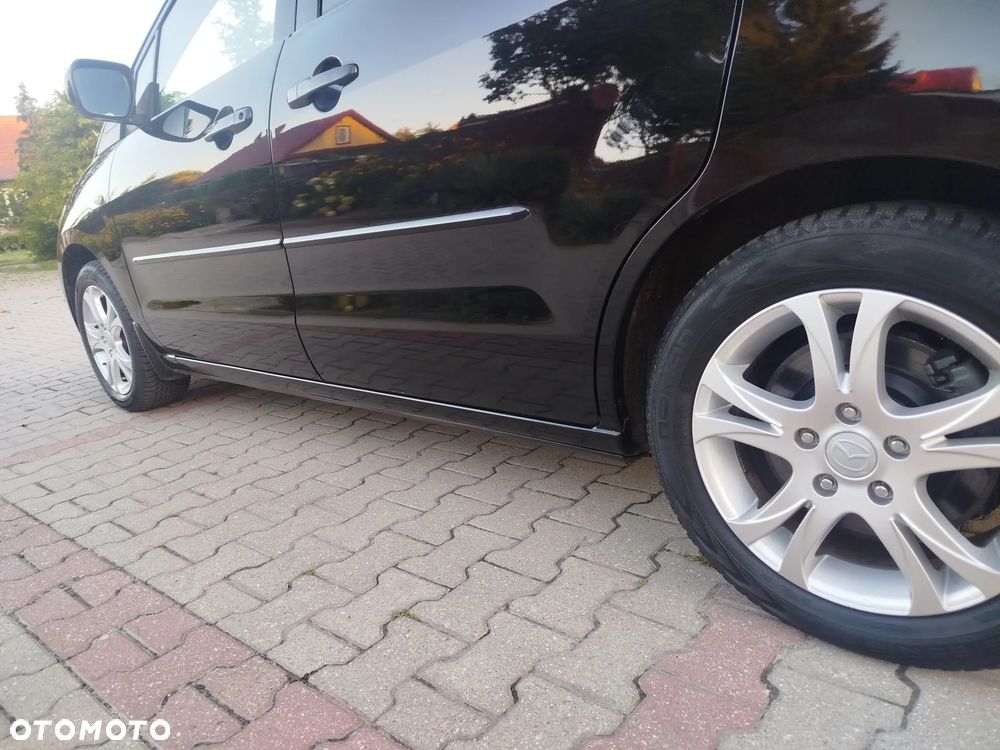 Mazda 5 2.0 Exclusive + - 11