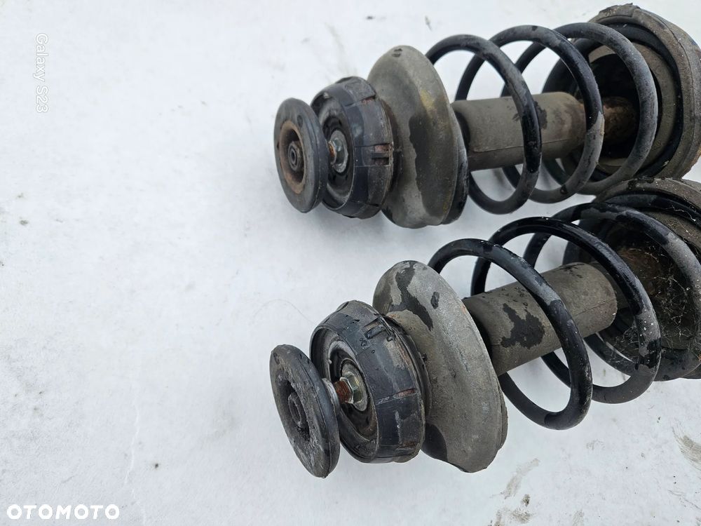 Amortyzator sprężyna McPherson lewy prawy przód Renault Clio II Lift 1,2 2005r - 2