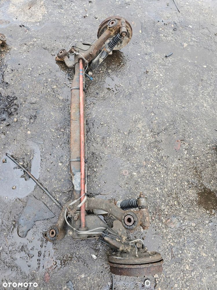 BELKA ZAWIESZENIA TYŁ PEUGEOT 206 1.4B - 1