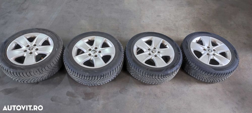 Set jante aliaj pe 16 volkswagen vw golf 6 hatchback an 2010 cu anvelope de iarna DOT 2021 - 2