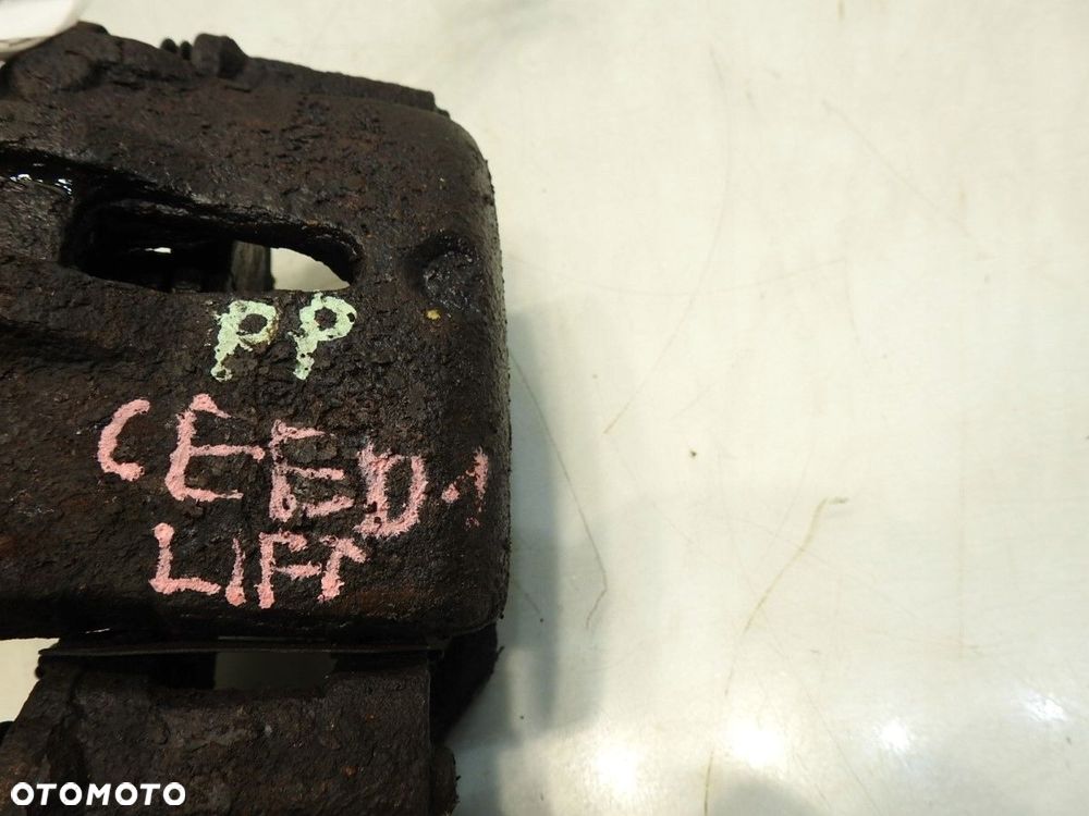 ZACISK HAMULCOWY PRAWY PRZÓD KIA CEED I 1.6 CRDI - 2