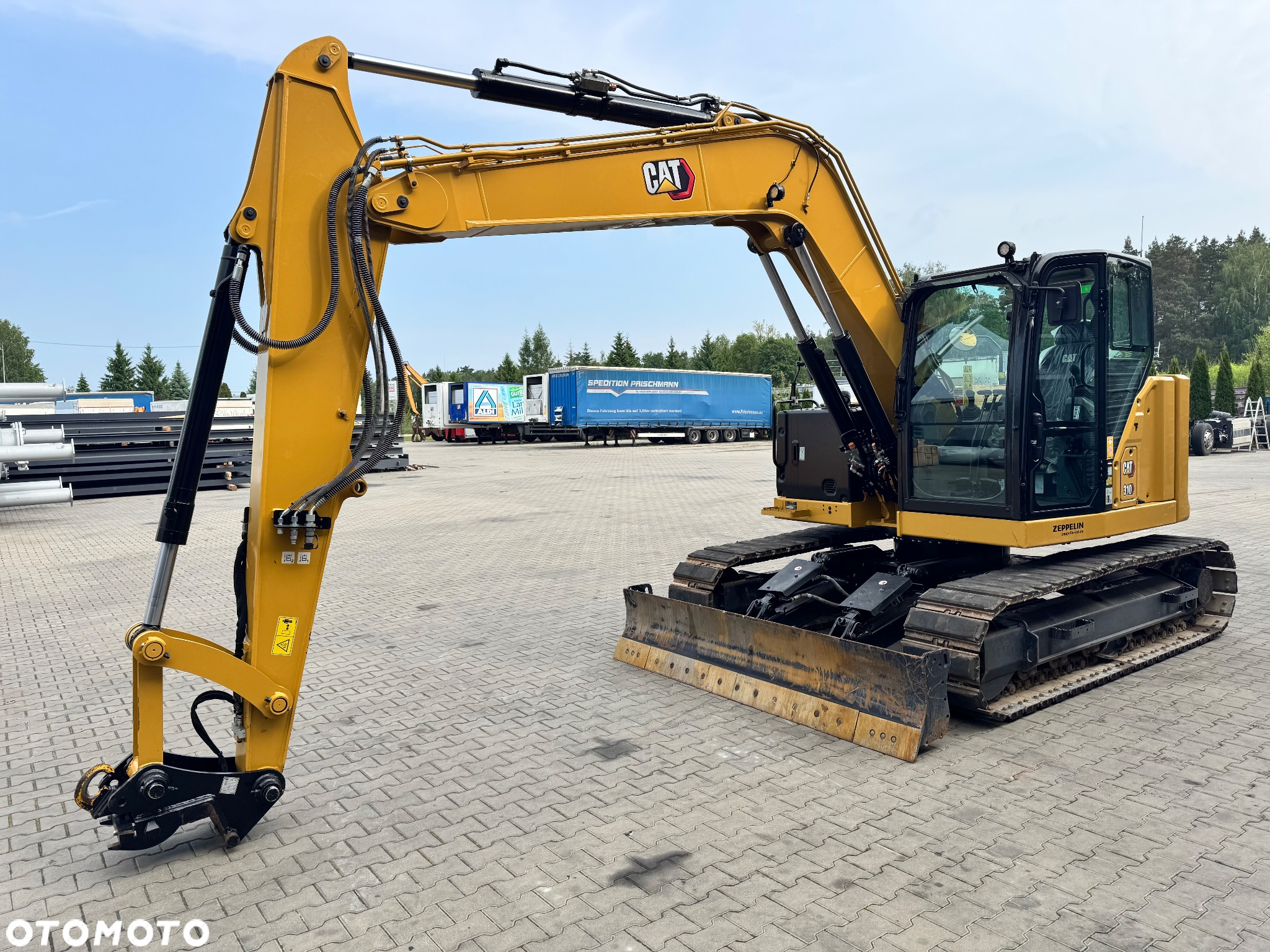 Caterpillar 310 - 5