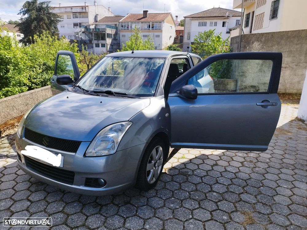 Suzuki Swift 1.3 DDiS GLX - 8