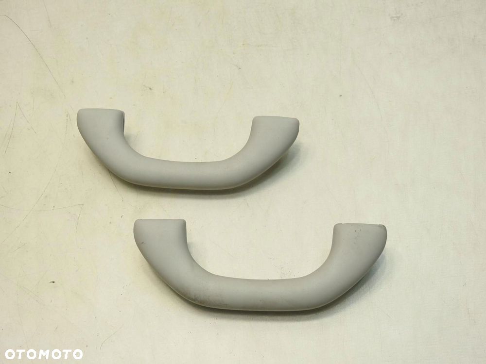 RĄCZKA UCHWYT PODSUFITKI PRZÓD SKODA FABIA II 6Y0857607M - 2