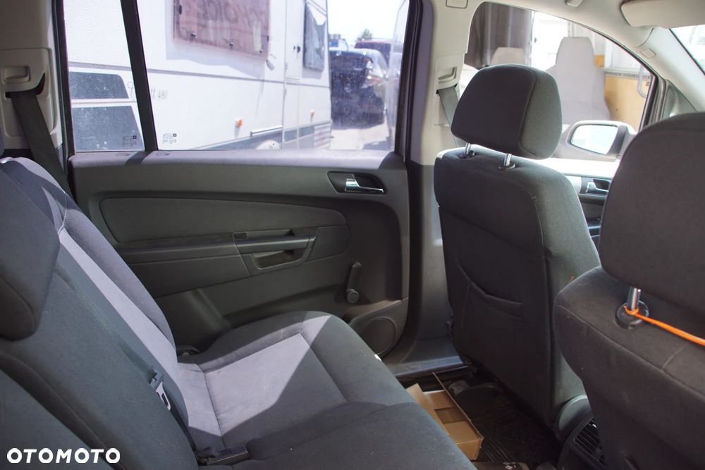 Auto na części - Opel Zafira B 1.8 16V 140 KM Z18XER F17 Z157 2006R Silnik Skrzynia Drzwi Maska Błotnik Zderzak Klapa Lampa Lusterko Klamka Szyba Deska Kokpit Sterownik Moduł Czujnik Licznik Wyświetlacz Panel Kierownica - 14