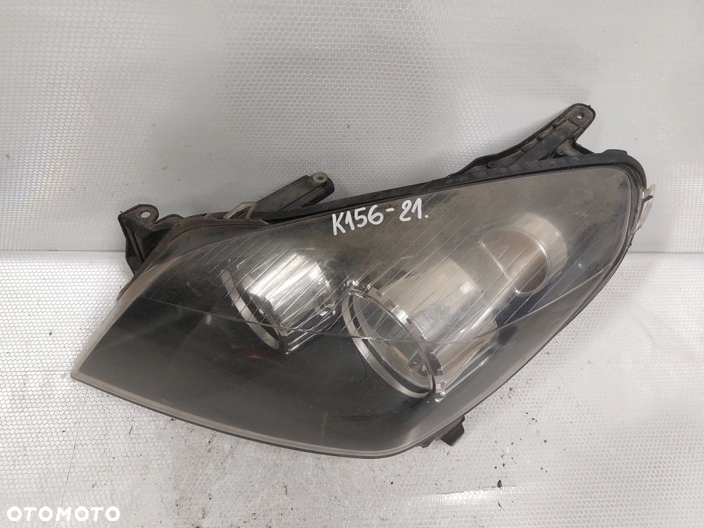 .  LAMPA PRZOD PRZEDNIA LEWA OPEL ASTRA H - 2