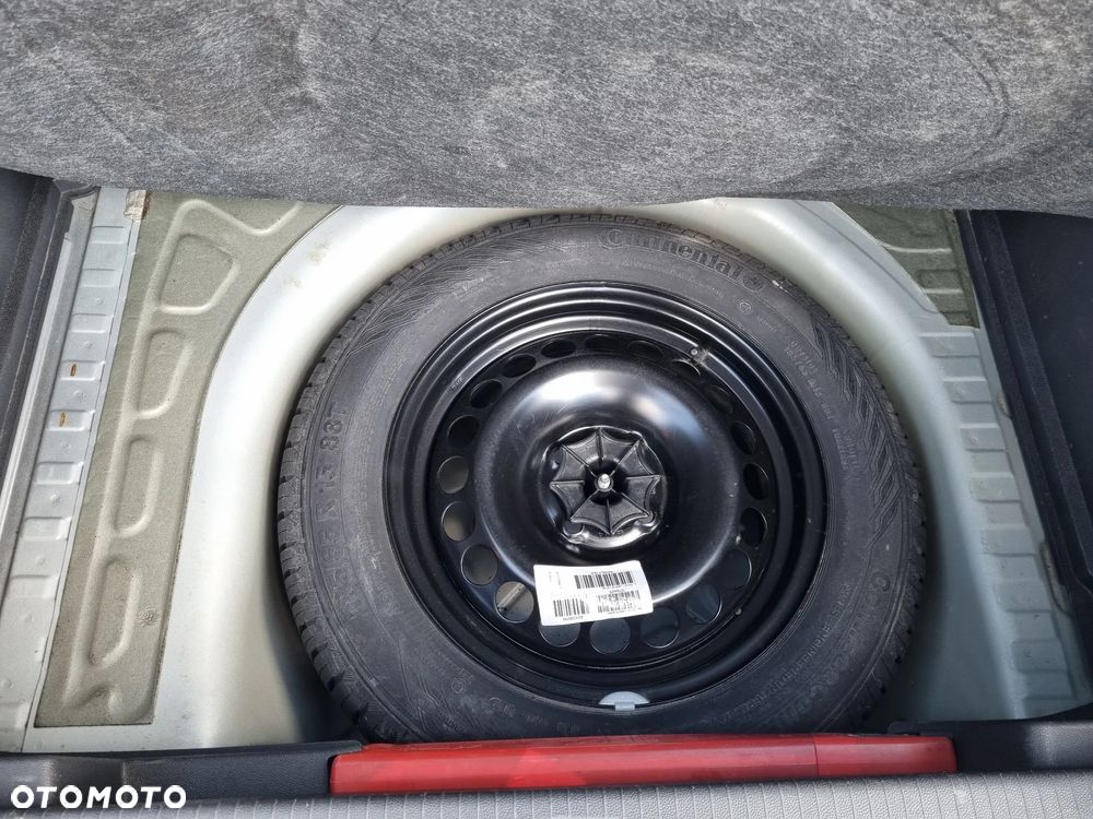 Opel Corsa 1.2 16V Enjoy - 22