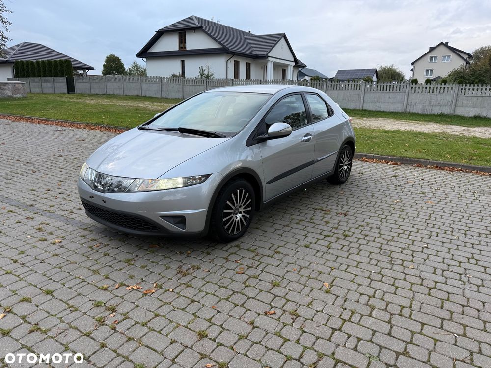 Honda Civic 1.8i-VTEC Comfort - 1