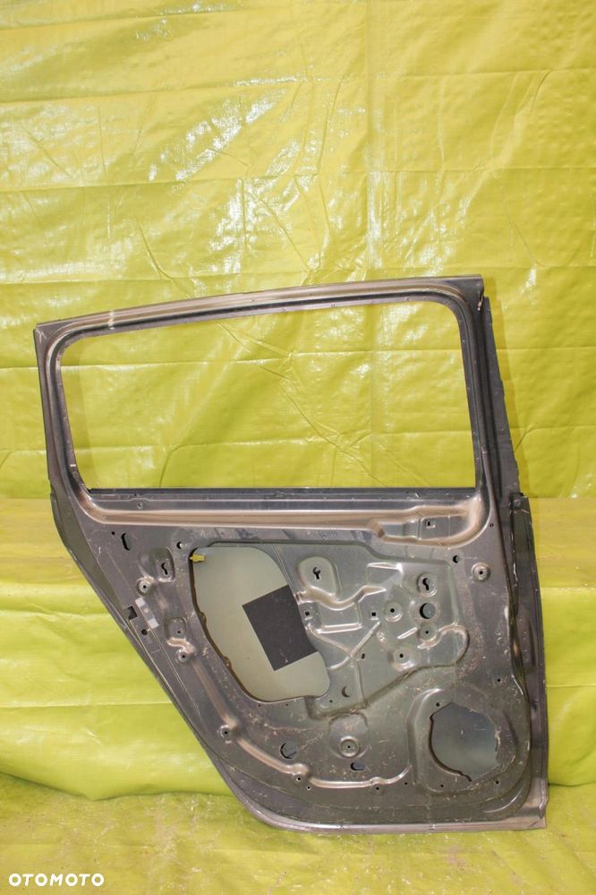 Drzwi Opel Zafira C 2011-2019r. tył lewy - 2