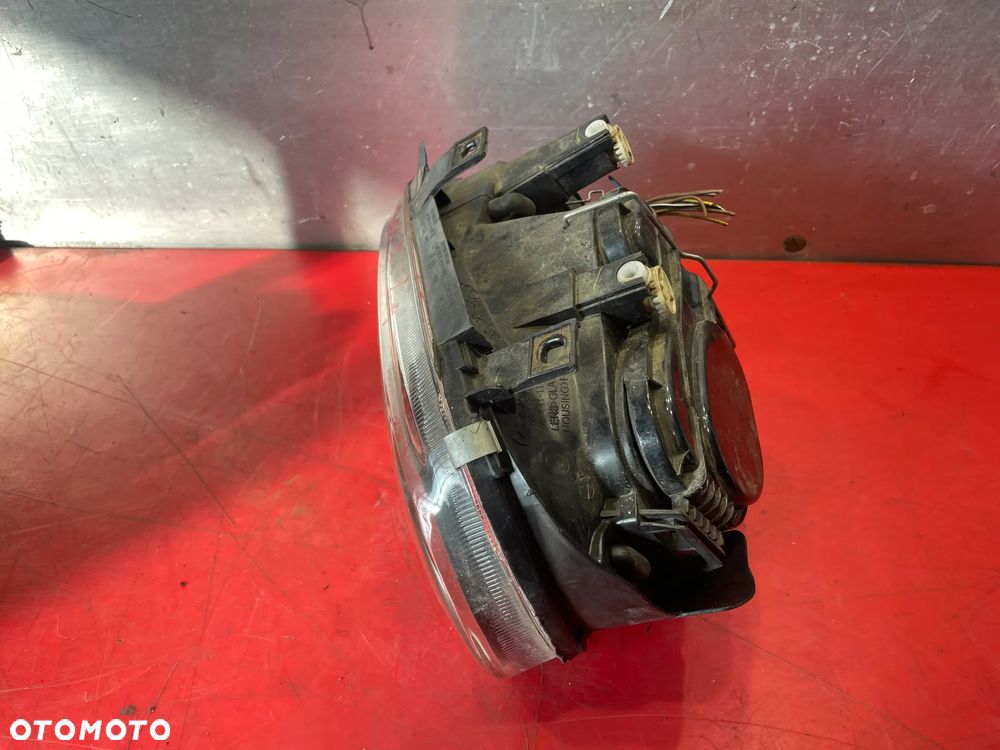 Lampa przednia lewa VW Golf 4 - 5