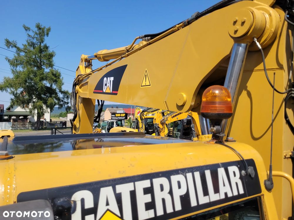 Caterpillar M315C / ROTOTILT ze szczypcami / ZADBANY EGZEMPLARZ / - 23