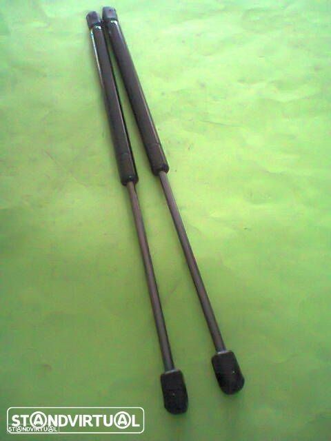 amortecedores tampa mala vw polo 1994-2001 novos - 1