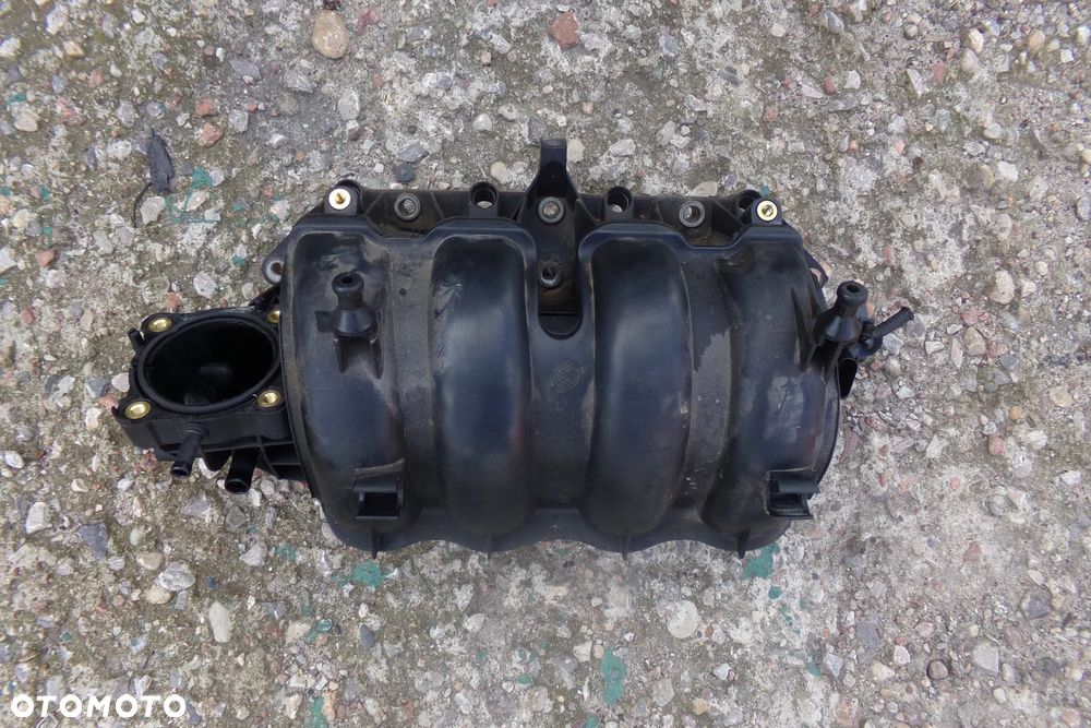 Kolektor ssący 036129711DE 1,4b 1,6b Audi VW Seat Skoda
