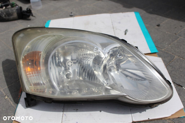 LAMPA LEWA LEWY PRZÓD COROLLA E12 LIFT HATCHBACK EUROPA