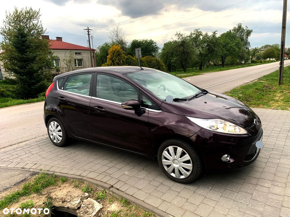 Ford Fiesta 1.4 Ghia - 11