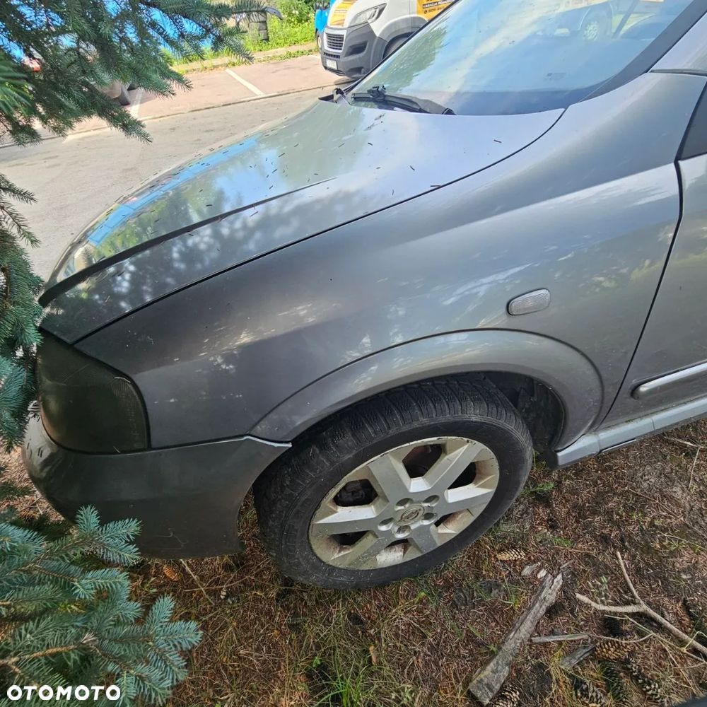Błotnik przód / błotnik przedni / prawy lewy przód / Opel Astra - G - Cabrio (2002r) (kod lak: Z4AU) - 2