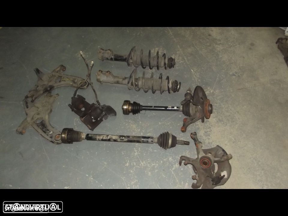vw polo tranmissoes amortecedores c/mola e braços de suspenção - 1