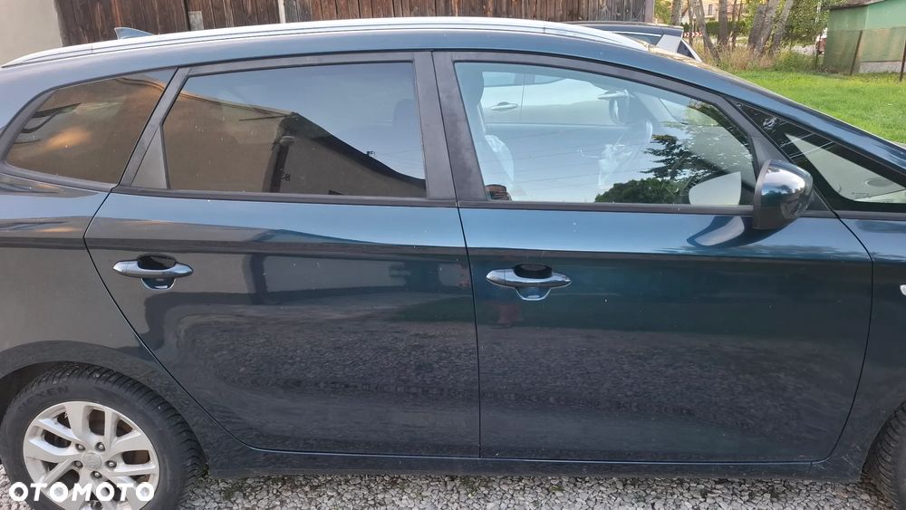 Kia Carens - 3