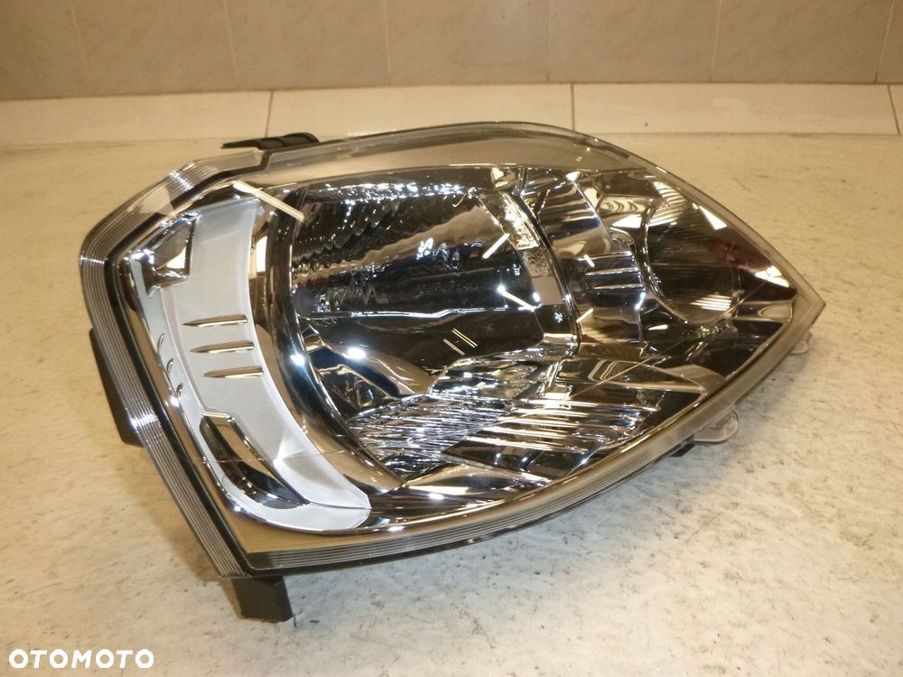 DACIA LOGAN 08-13 LAMPA PRAWY PRZÓDPRZEDNIA ORYGINAŁ - 9