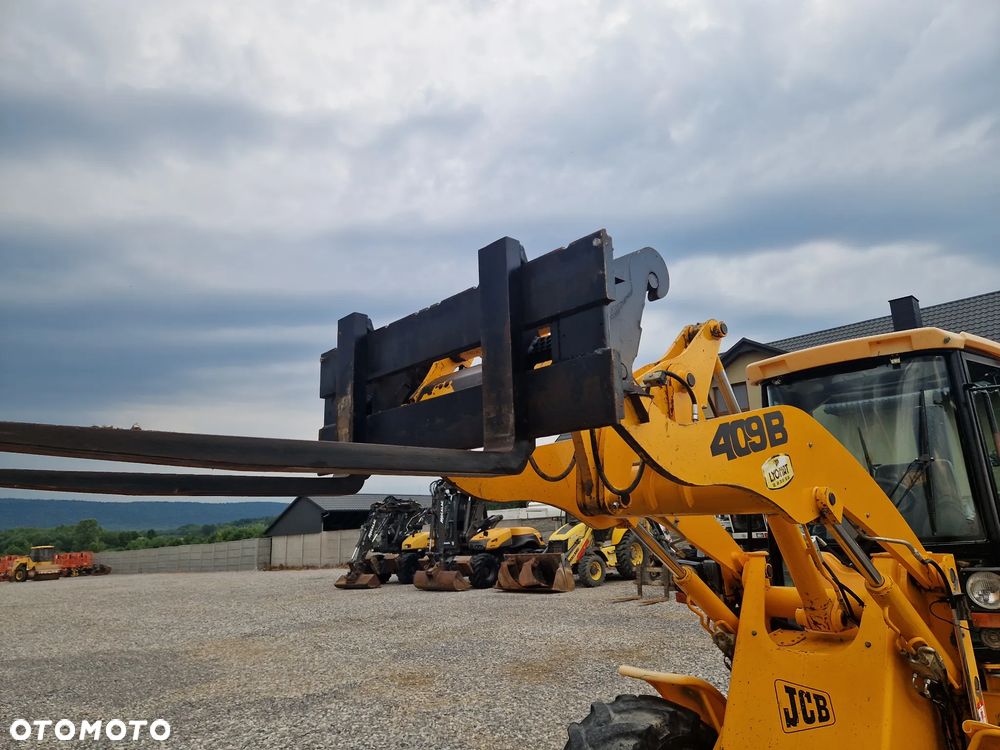 JCB 409 - 14