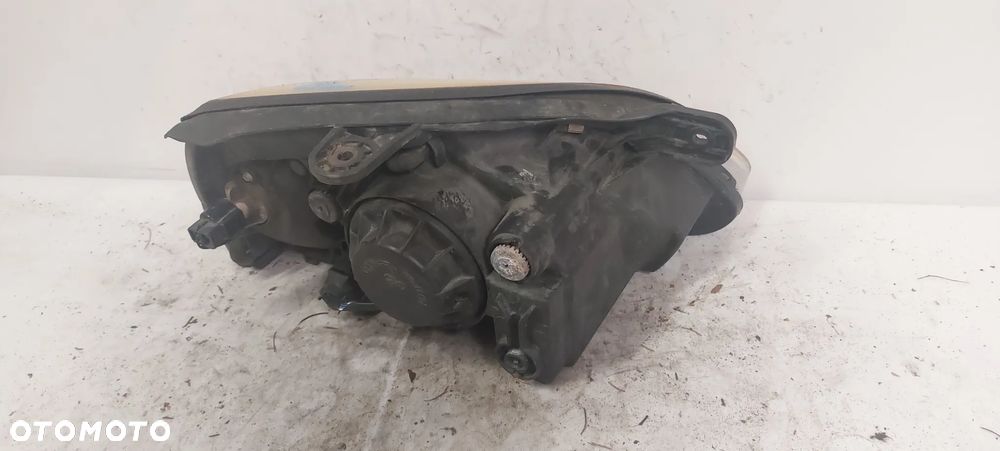 .  PRZOD PRZEDNIA LAMPA LEWA KIA RIO 1 - 4