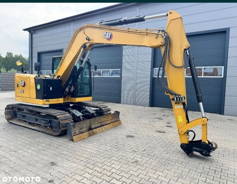 Caterpillar 310 - 4