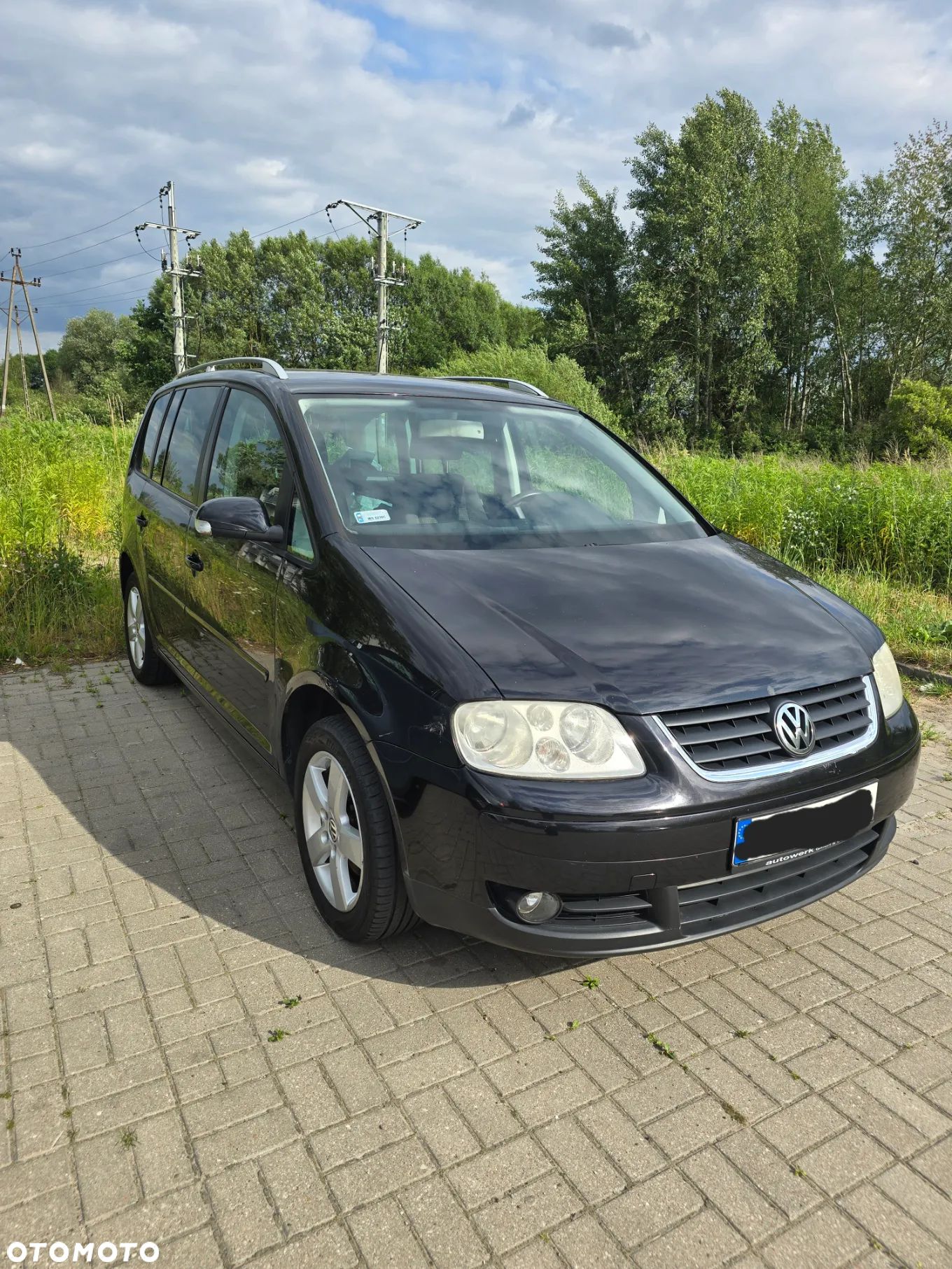 Volkswagen Touran - 1