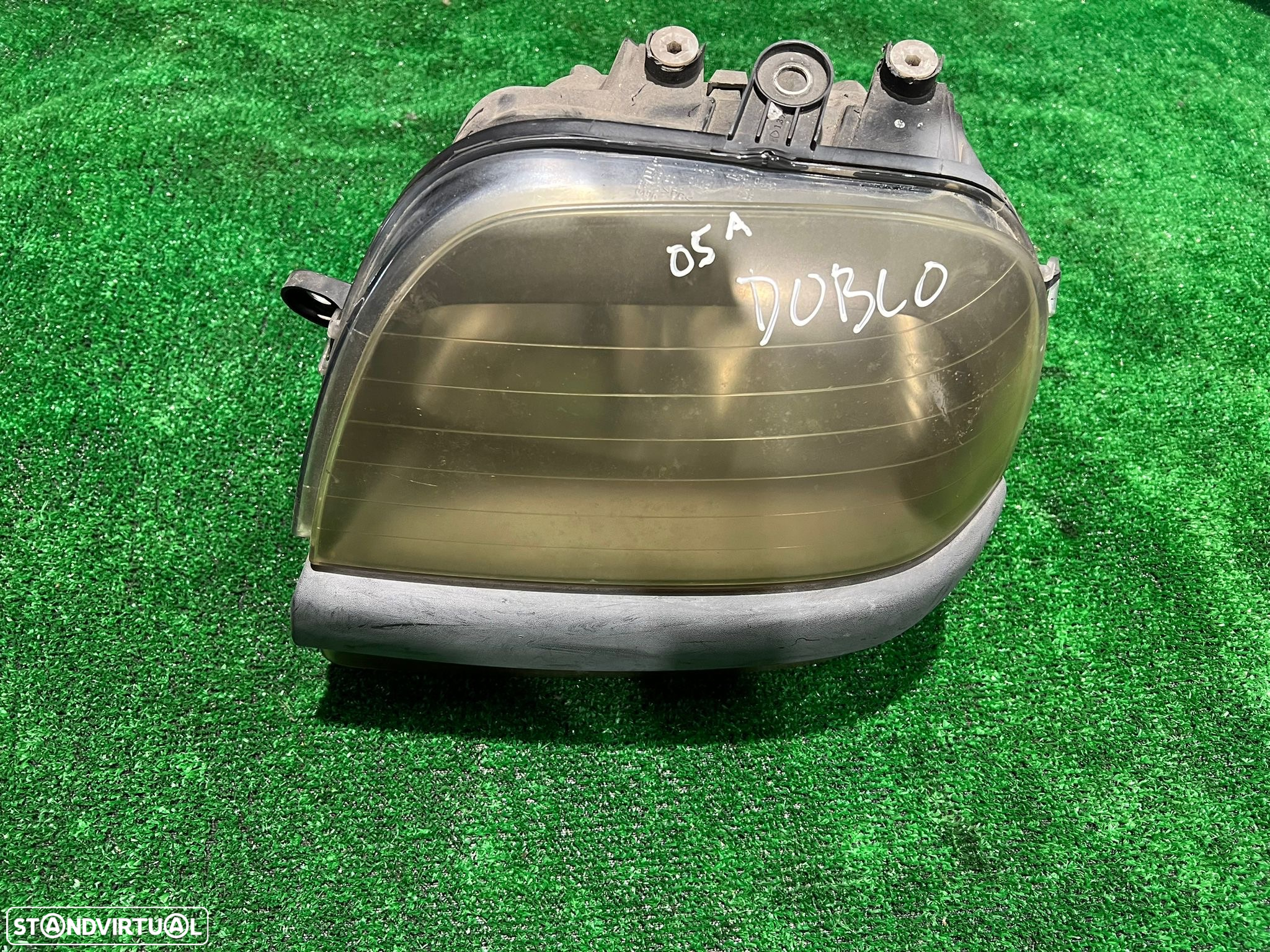 Farol esquerdo Fiat Doblo 2005 - 2