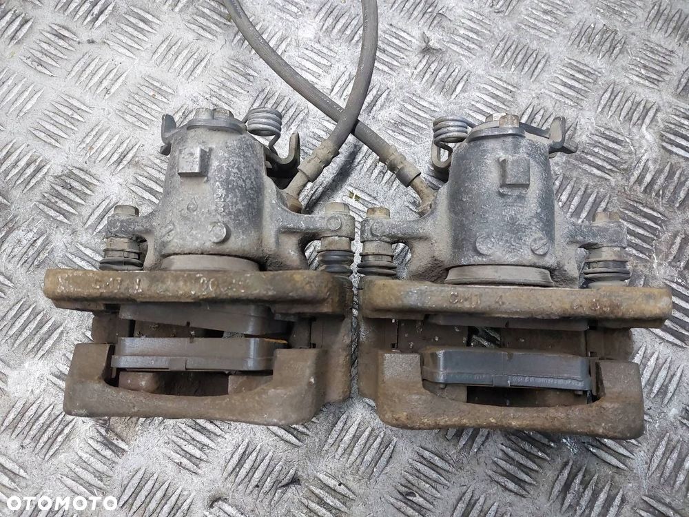 TARCZE HAMULCOWE TYŁ + KLOCKI + ZACISKI OPEL INSIGNIA A - 7