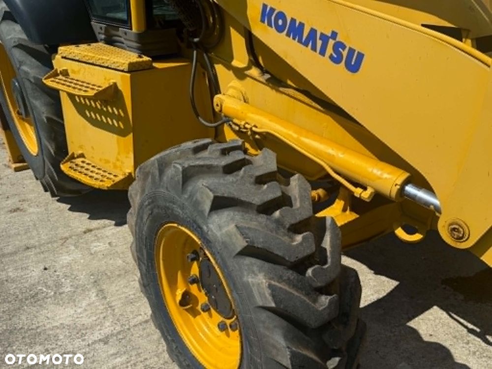 Komatsu Pełna opcja koparko-ładowarka KOMATSU WB07R, TEREX,FERMEC MF 76O - 4