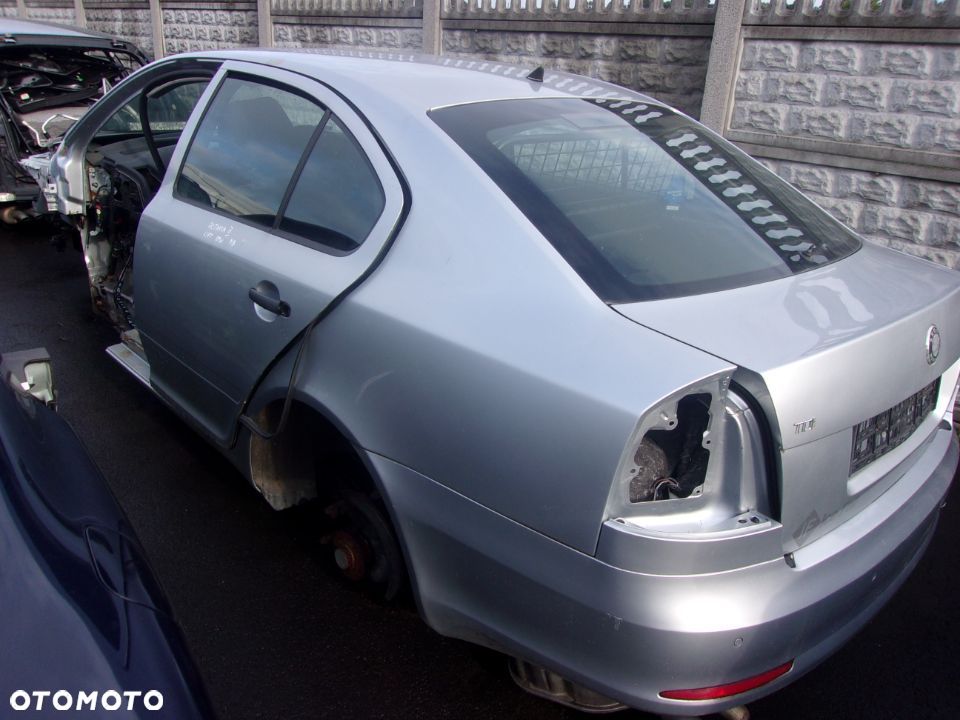 DRZWI Lewe Lewy Tył Skoda Octavia II 2 Lift