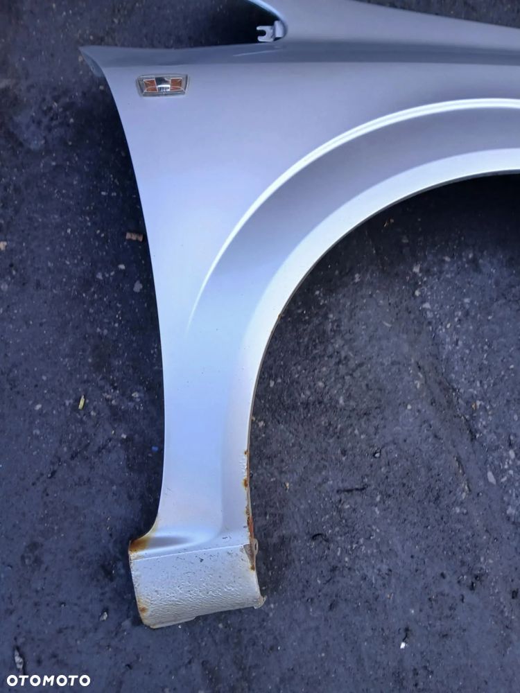 Opel Zafira B Błotnik prawy - 5