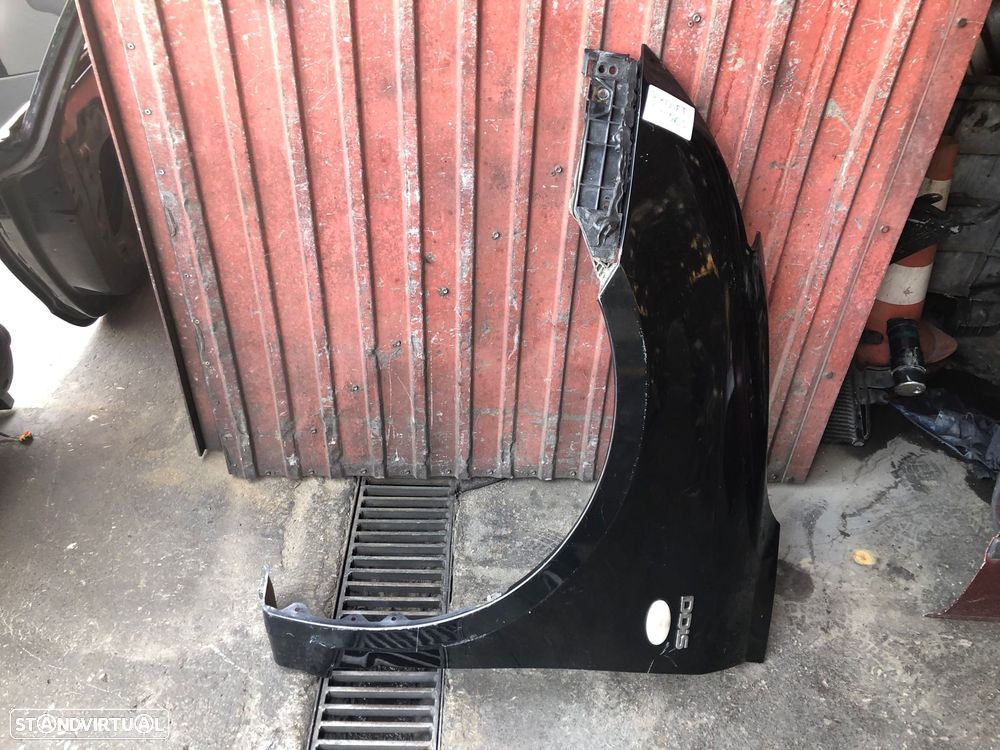 SUZUKI SWIFT GUARDA LAMAS ESQUERDO - GL065 - 1