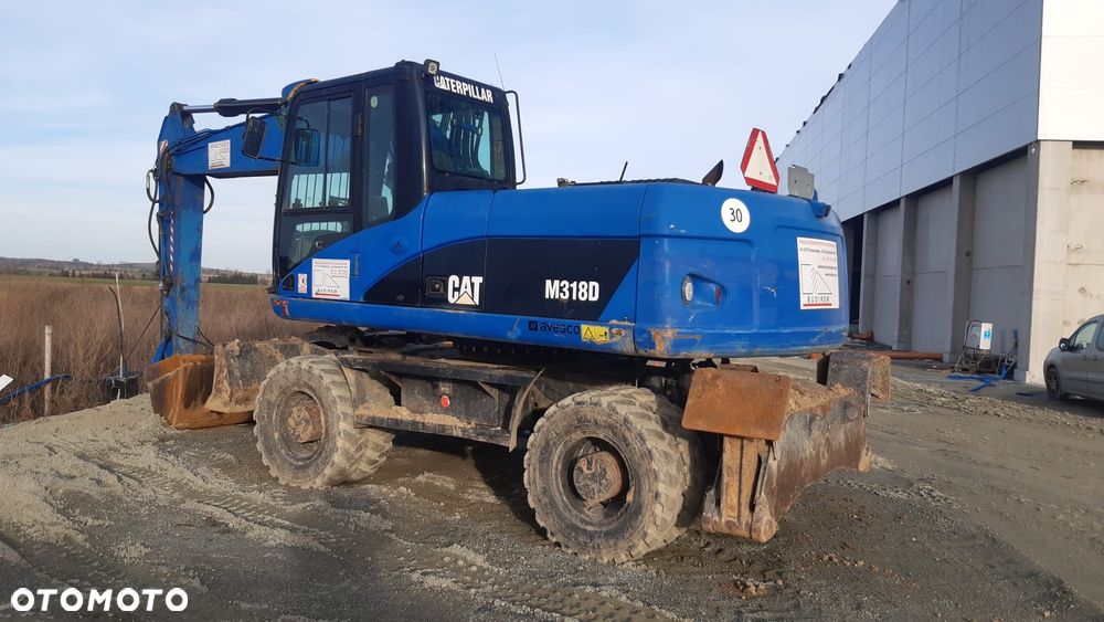 Caterpillar M318D - 3