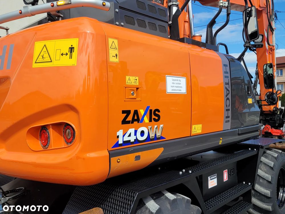 Hitachi ZX 140W / ROTOTILT ze szczypcami / system GPS 3D LEICA / - 12