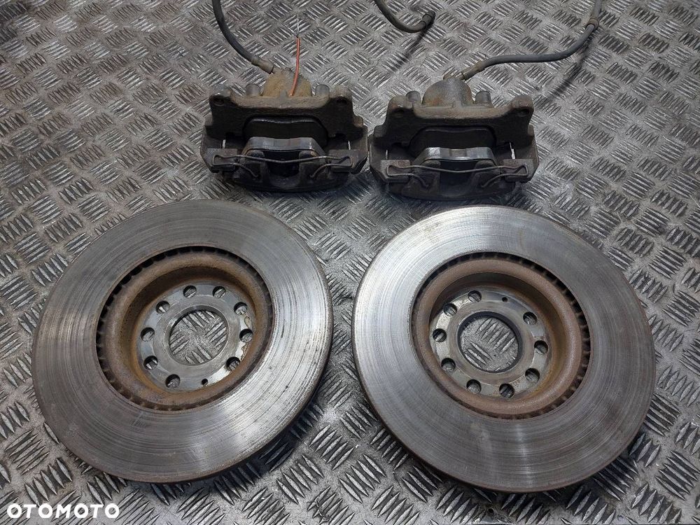 TARCZE HAMULCOWE PRZÓD + KLOCKI + ZACISKI VOLKSWAGEN PASSAT B6 2.0 TDI - 2