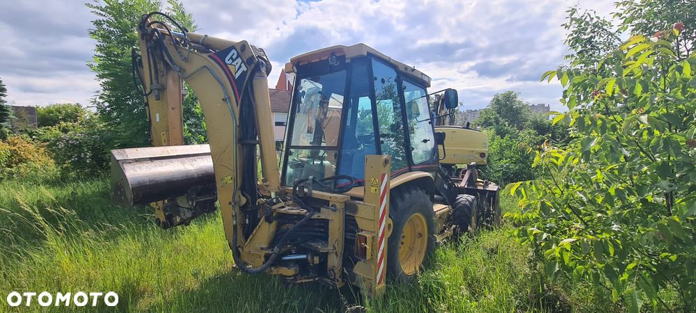 Caterpillar CAT 428D - 4