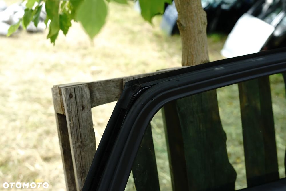 Drzwi tył tylne lewe Opel Astra J IV Kombi Z22C - 11