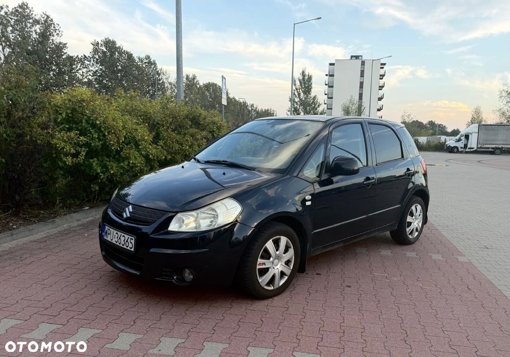 Suzuki SX4 1.6 GLX / Comfort - 1