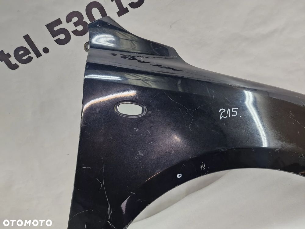 MAZDA 2 03-07 PRAWY BŁOTNIK PRZEDNI PRZÓD , NR AUKCJI BŁ215 - 9