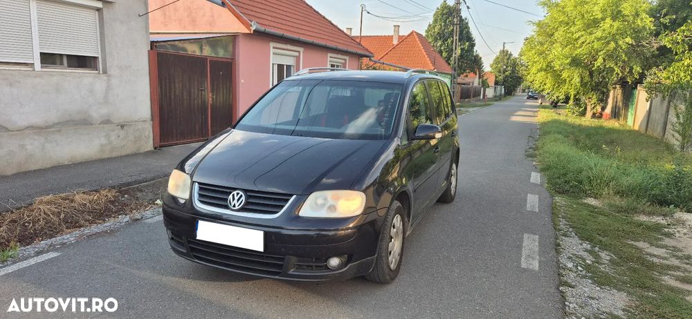 Volkswagen Touran - 1