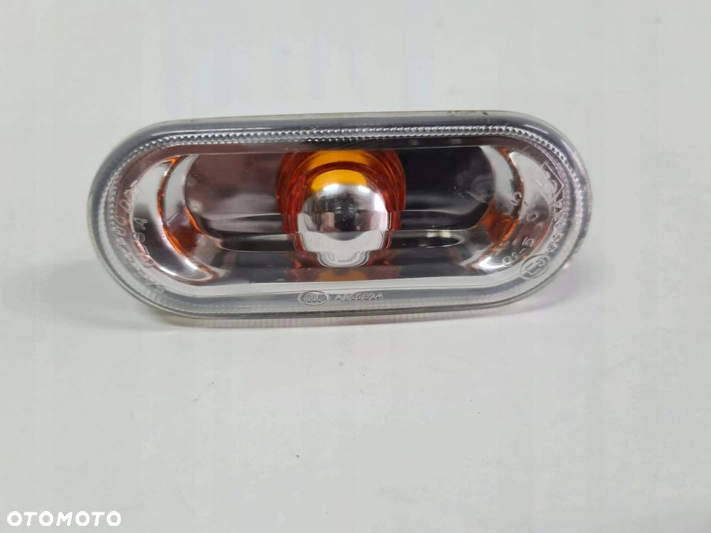VW T5 kierunkowskaz błotnika lewy prawy 7E0949117 - 1