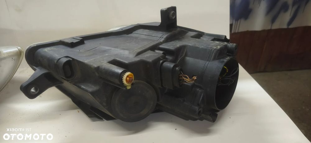 Lampy przednie VW Passat b6 lewa prawa komplet wszystkie części L041 - 11