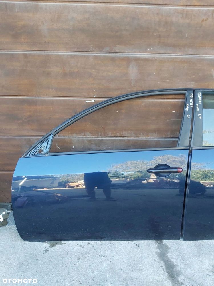 Nissan Primera P12 Drzwi lewy przód BW9 - 1