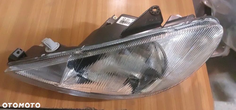Peugeot 206 Reflektor Lewy 572309-V - 6